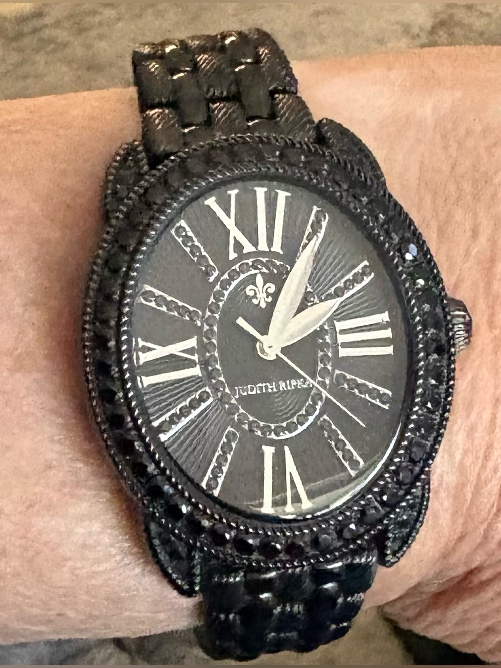 Judith Ripka black quartz watch
New battery 6/26